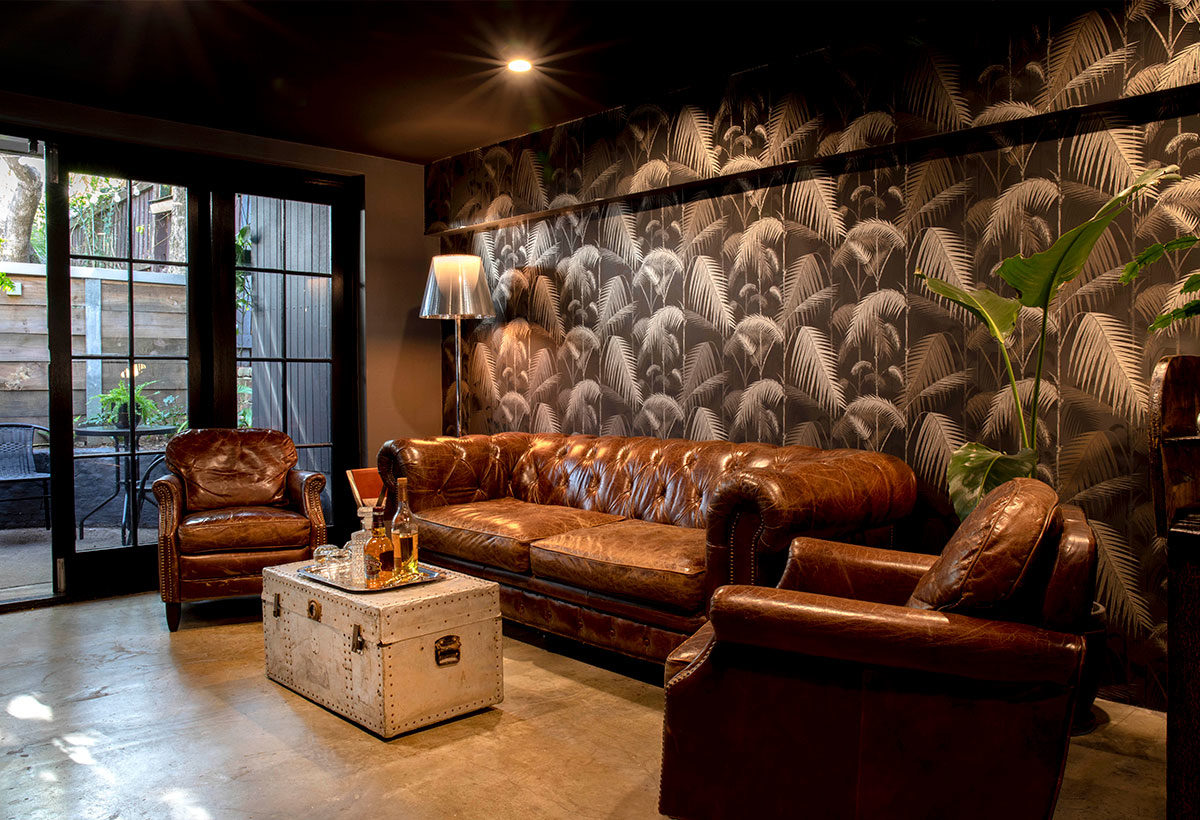 mister-chop-shop-barber-boys-club-chesterfield-tropical-wallpaper-cole-and-son-flos-ktribe-floor-lamp